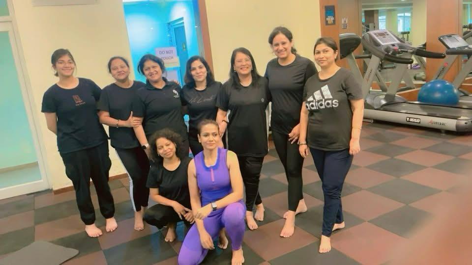 Kanchan's indoor yoga group at the gym