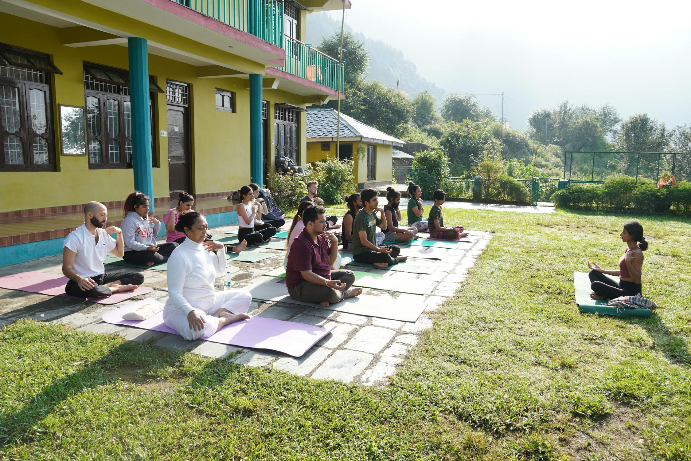 Community yoga session in the hills of India